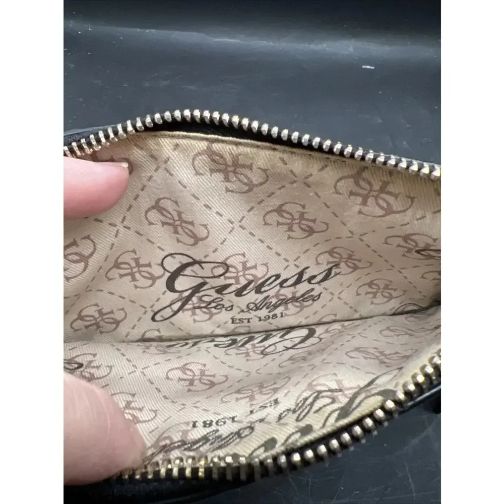 Guess Black Clutch Wristlet with Tassel‎ Pull and Monogrammed Interior Liner